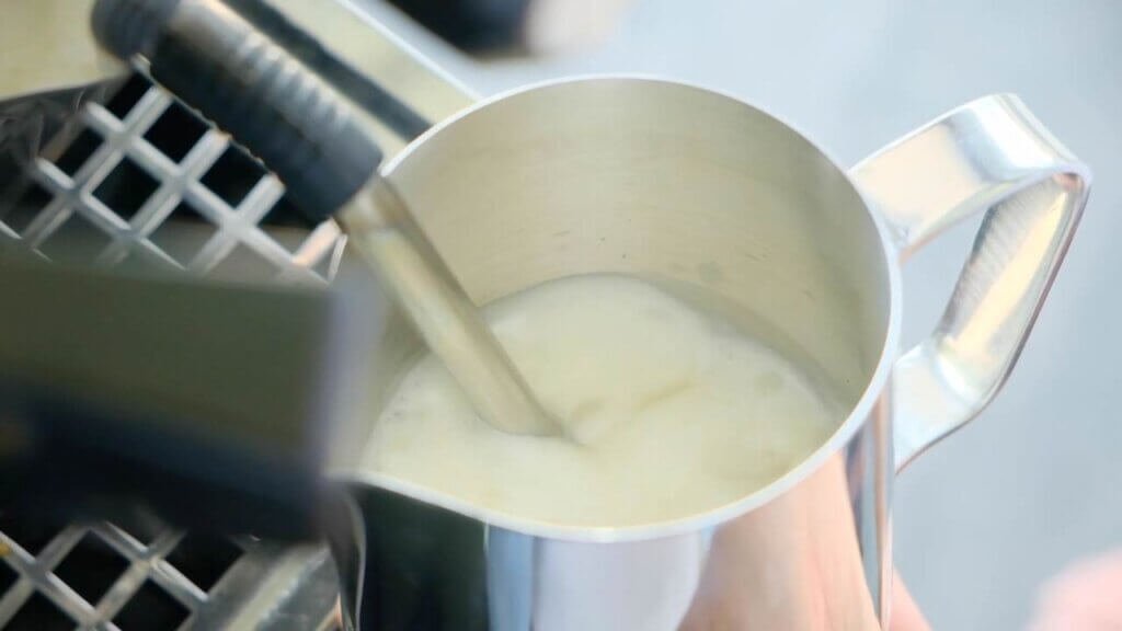 Process Of Steaming The Milk With Steamer